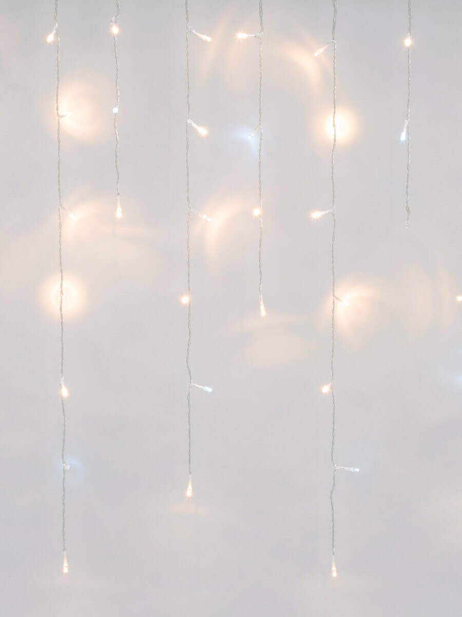 фото уличная светодиодная гирлянда uniel бахрома 220v теплый белый-белый uld-b3010-200/ttk warmwhite-white ip44 ul-00003949 | 220svet.ru